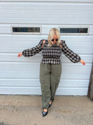 running in flannel smocked top