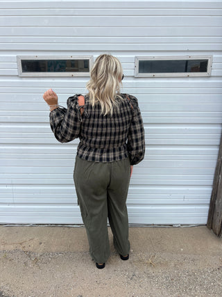 running in flannel smocked top