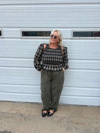 running in flannel smocked top