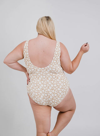 pop of floral tan one piece swim