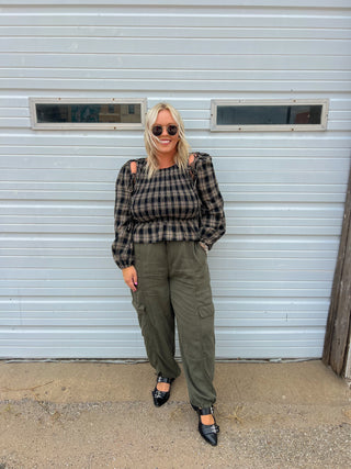 running in flannel smocked top