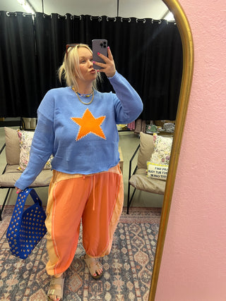 who me shining blue star sweater