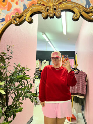 it's giving chic sporty girlie red sweatshirt