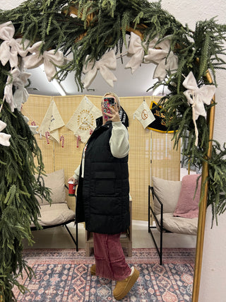 here for it long puffer vest