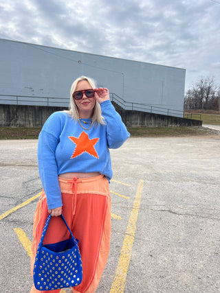 who me shining blue star sweater