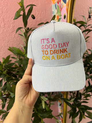 drink on a boat trucker hat
