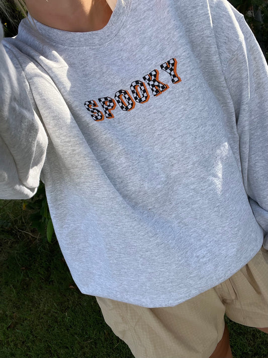 spooky checkered sweatshirt