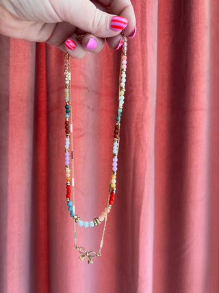 all of it multi layered + colored necklace