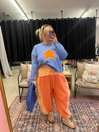 who me shining blue star sweater