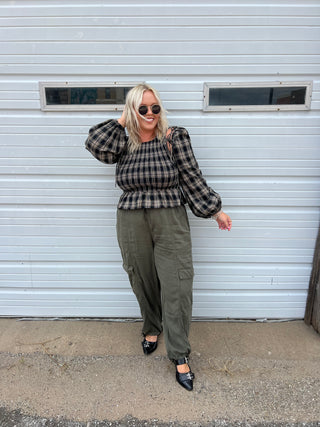 running in flannel smocked top