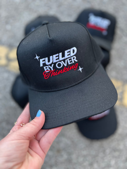 fueled by overthinking trucker hat