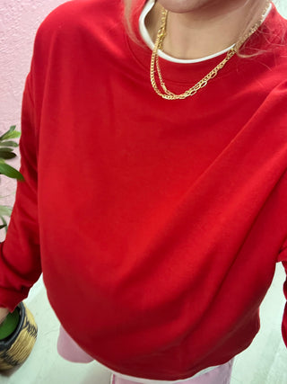 it's giving chic sporty girlie red sweatshirt