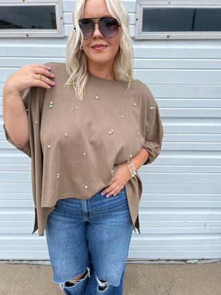 on a pearl notice top