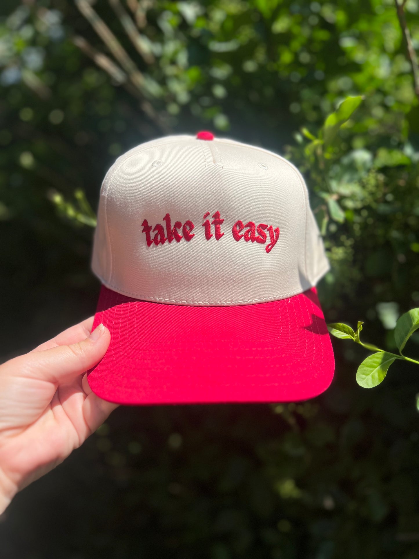 take it easy red trucker hat