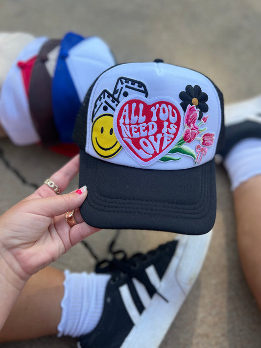 all you need is love trucker hat