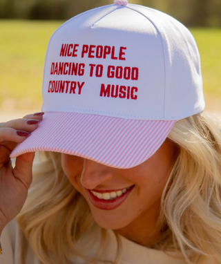 people dancing trucker hat