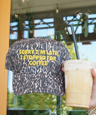 sorry im late printed trucker hat